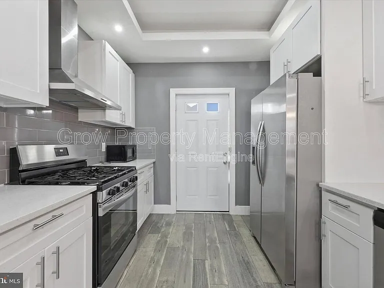 1935 N Newkirk St — Photo 17