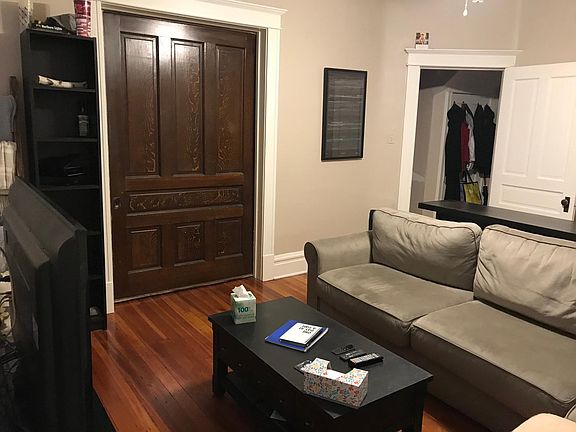 Original floors and sliding pocket door and ample closet storage. This room could be used as a living room, dining room or bedroom.