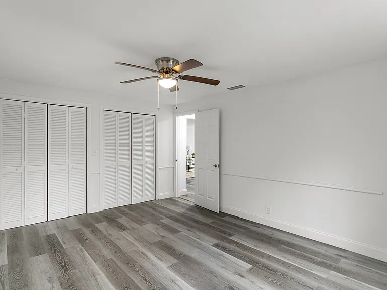 Bedroom 2- leads to back patio