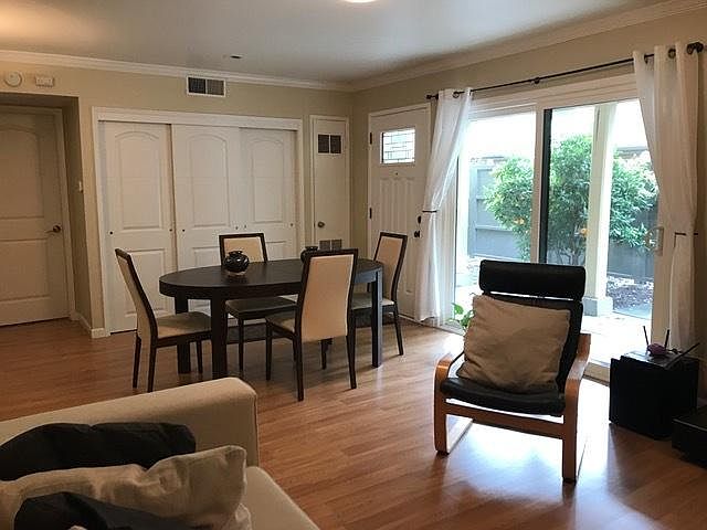 living room, access to a private patio