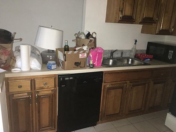 Kitchen view #1 (walk in front door)