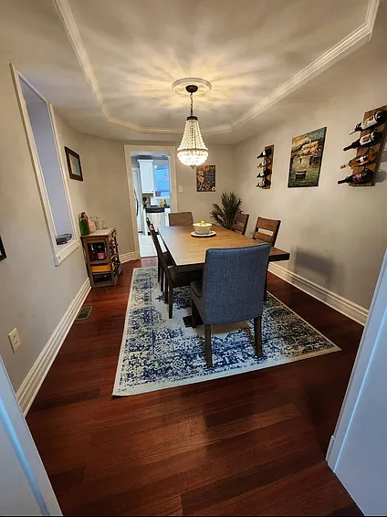 Furnished Dining Room. View from outside Powder Room
