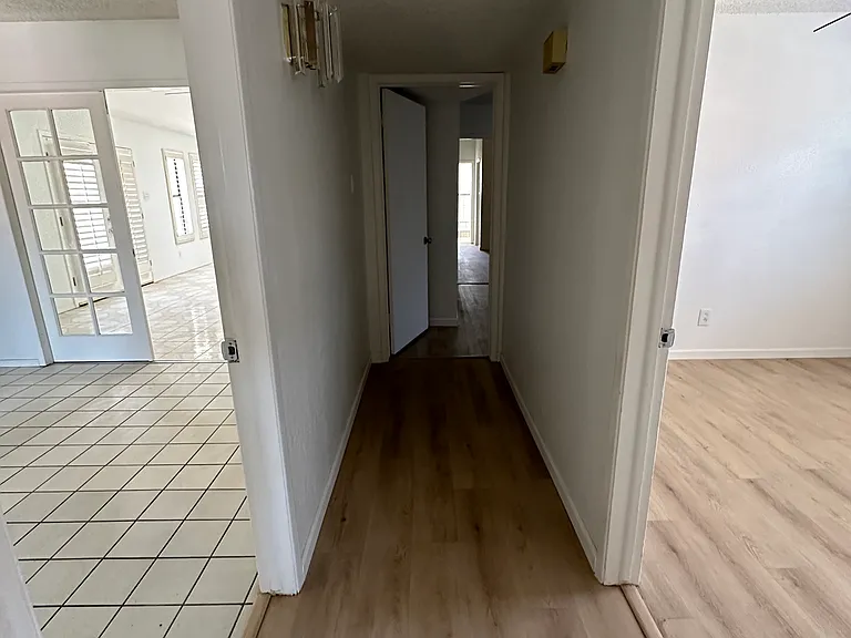Kitchen/dining area (left hand side)
Second bedroom (right hand side)
Straight ahead (3rd bedroom and then master bedroom