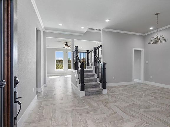 Upon entering this beautiful new construction, you will notice the designer materials used throughout the home