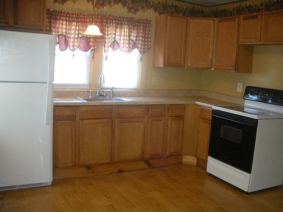 Kitchen view. New flooring being installed in June 2025.