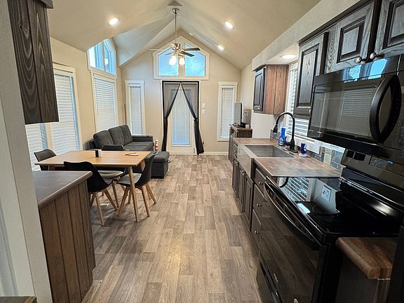 INTERIOR KITCHEN, DINING, LIVING ROOM