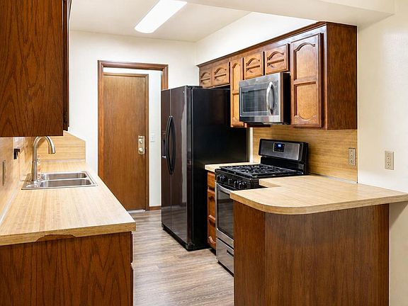 Kitchen with Gas Range and Microwave