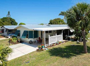 704 Hyacinth Cir, Barefoot Bay, FL 32976
