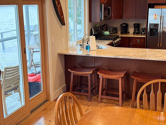 View of the dining room looking into the kitchen