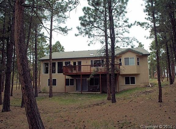 Redwood deck off great room and patio below.