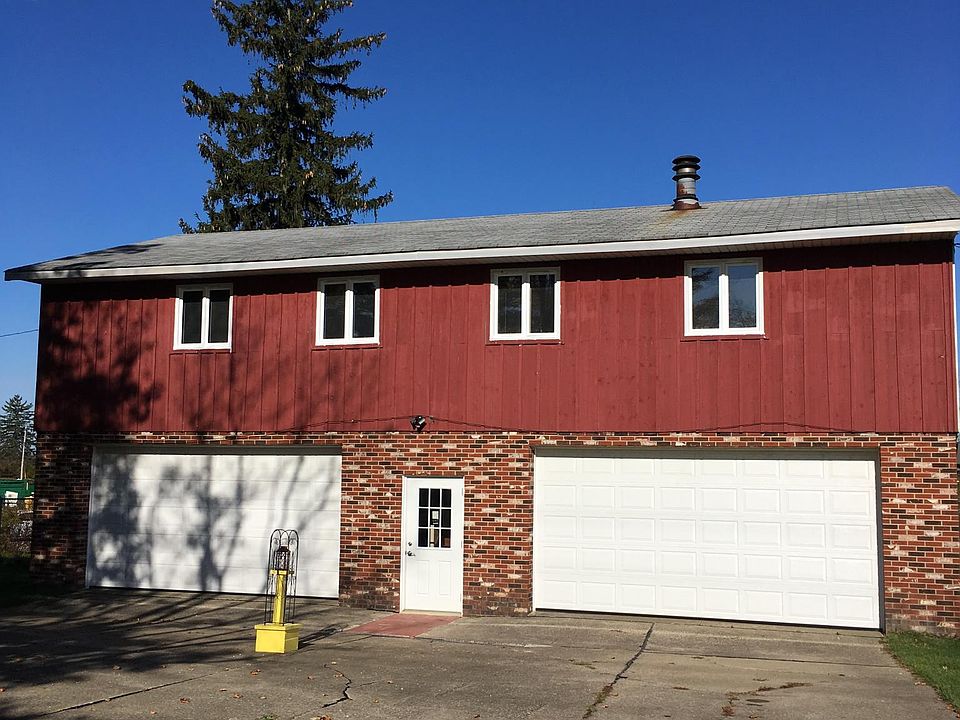 Unit 1 is on the right. Two car garage is underneath. Laundry hookup available in the garage.