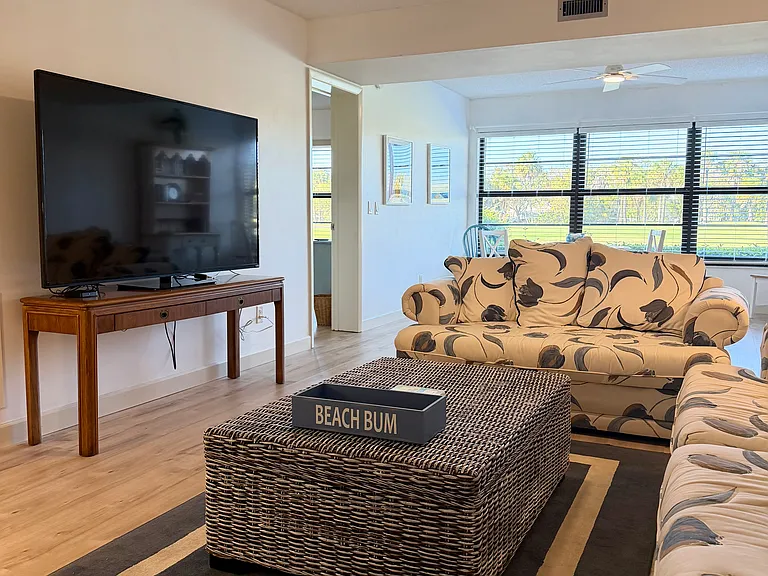 Beautiful living area w/ newly installed plank floors throughout