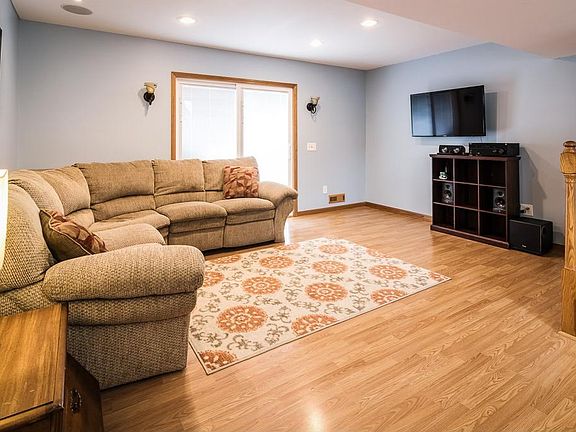Open plan living room with walk-out to private patio.