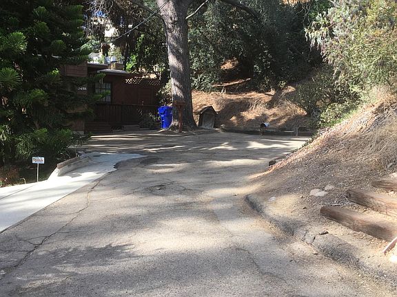 End of Cul de Sac with home to left in photo showing ample parking