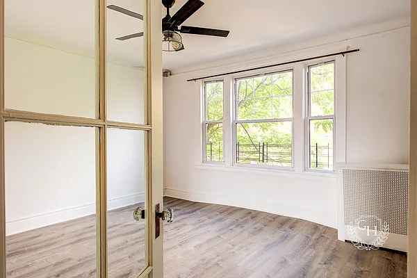 For $2.3M, this Georgian townhouse in Jackson Heights has