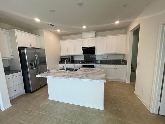 5th image of 7585 Holland Park St