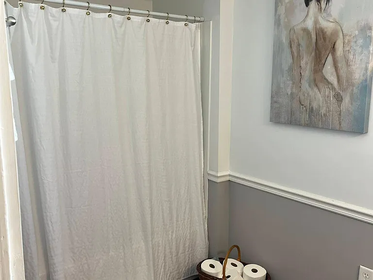 View of shower and tub