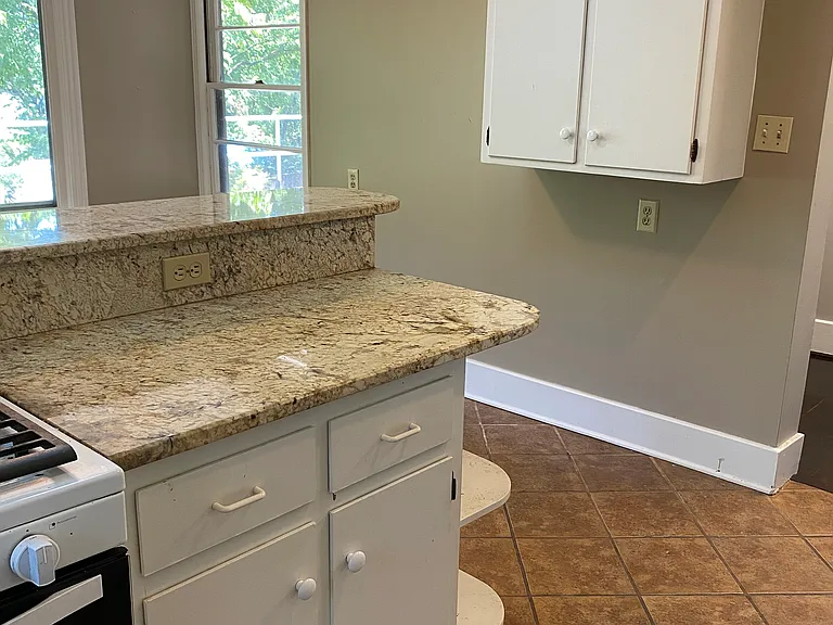 kitchen has plenty of cabinets