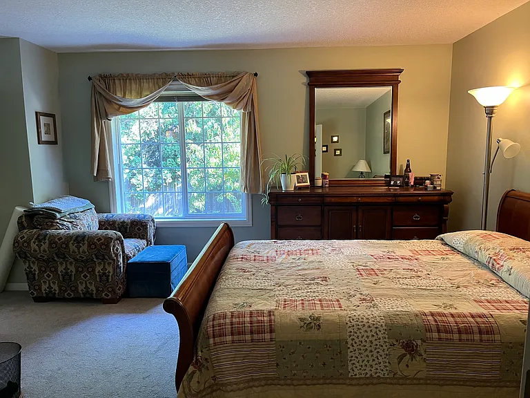 master bedroom from hallway facing backyard