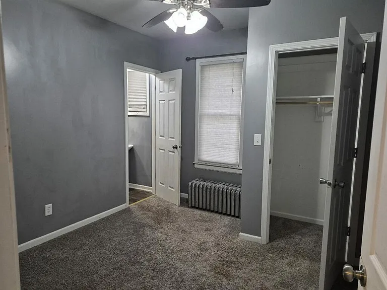 bedroom 1 with half bath
