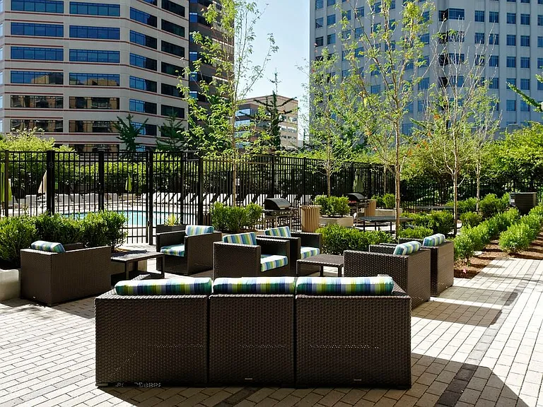 Courtyard with barbecue grills and lounge seating