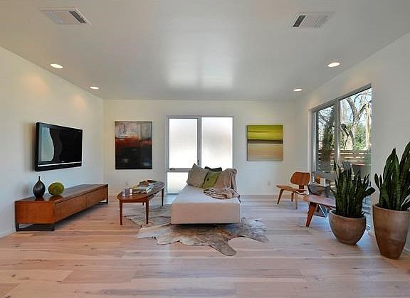Owner has maintained the white oak hardwoods beautifully - no pets, no kids and lots of travel equals minimal wear.