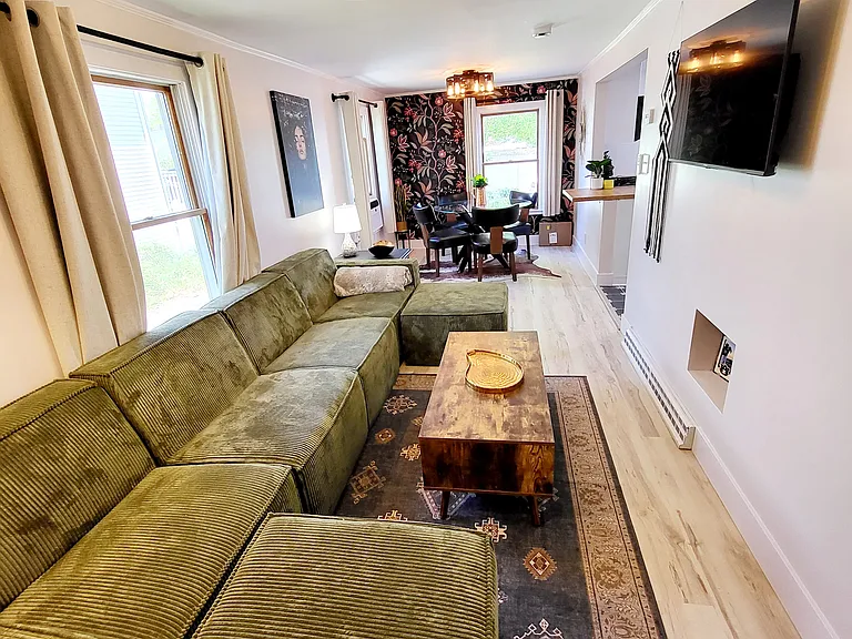 Open space lIving area with smart TV