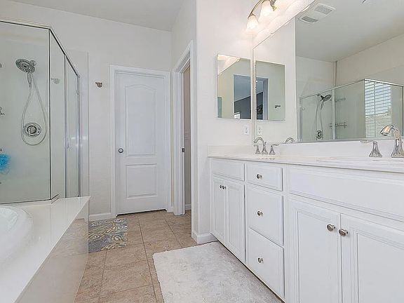 Master bath with walk-in closet