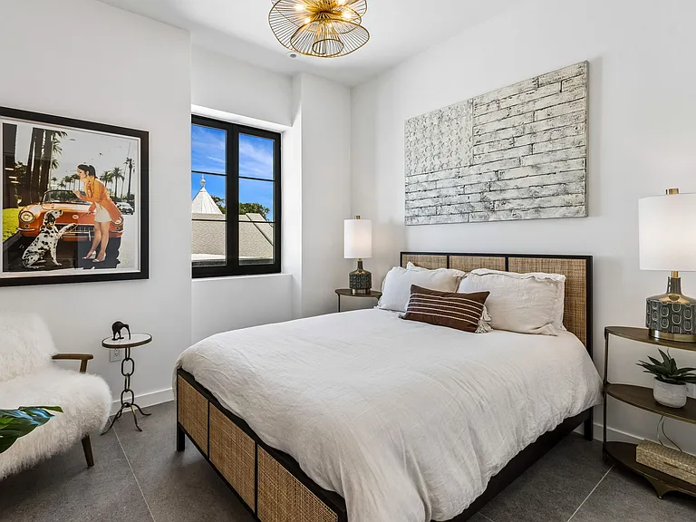 Queen size bed in guest bedroom