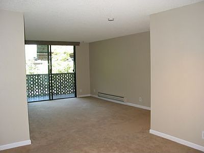 A spacious dining area flows into the living room