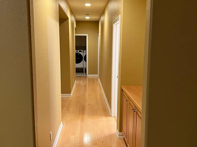 Hallway to bedrooms, bathrooms, laundry room