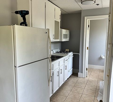 kitchen, fully applianced- stove, fridge and microwave