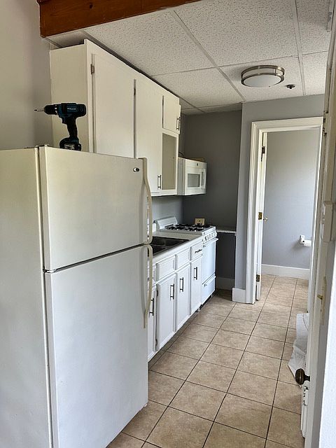kitchen, fully applianced- stove, fridge and microwave