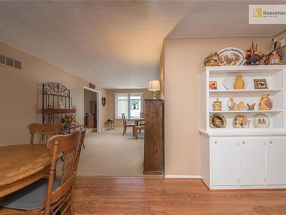 The kitchen is an eat-in and all appliances stay.