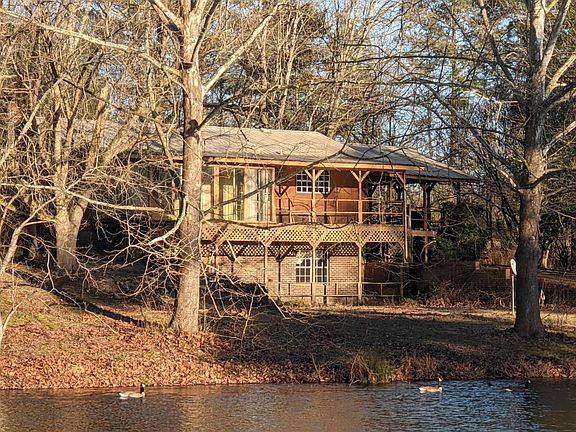 Back of main house facing west along the south pond