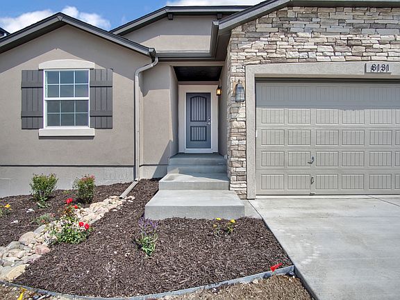 Welcoming Porch Photo representing home to be built and may demonstrate optional features