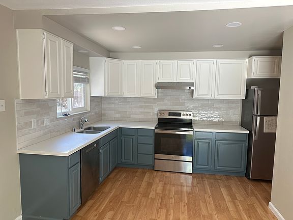 Refreshed kitchen, new appliances, lighting, countertops
