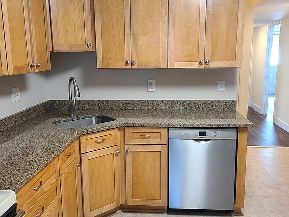 Granite countertops, ceramic tile flooring