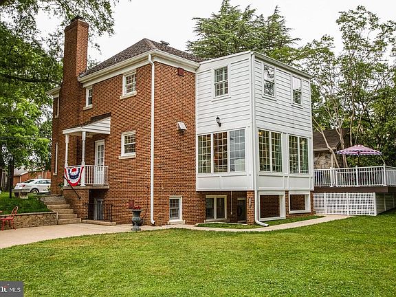 Side and back of the home with multiple exits
