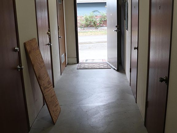 Storage area accessible through the garage or exterior door on the east side of the building