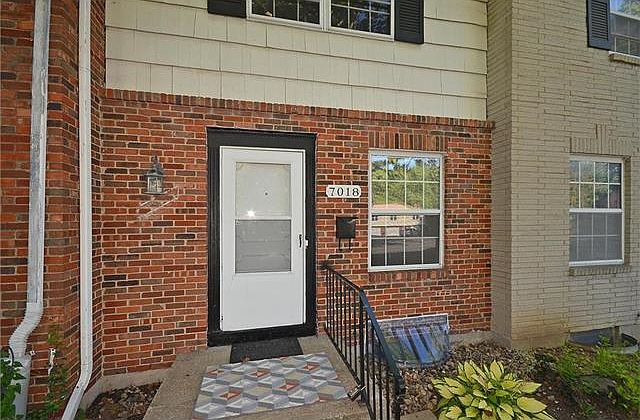 1st image of 7018 NW Chapel Woods Ln