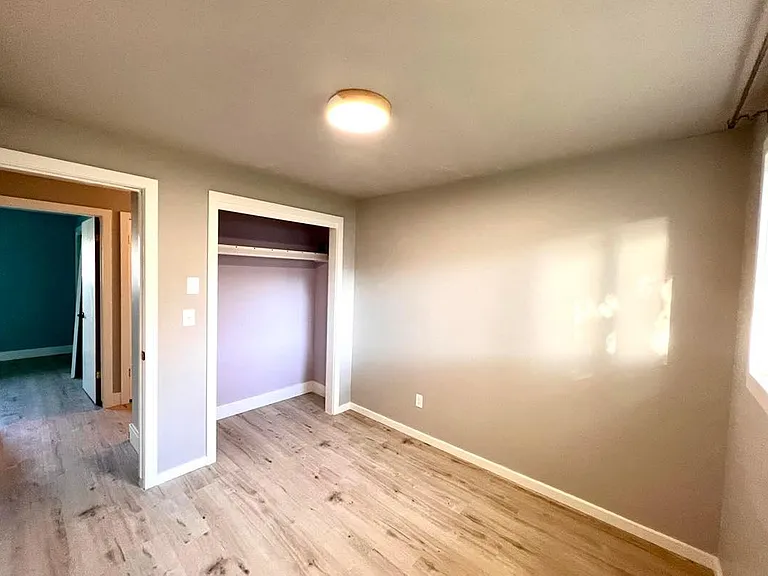 Smaller Bedroom, Lavender Closet, new flooring, new lighting!