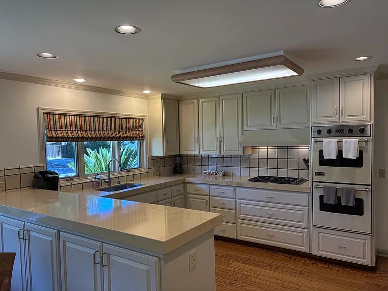 Bright kitchen with generous storage space