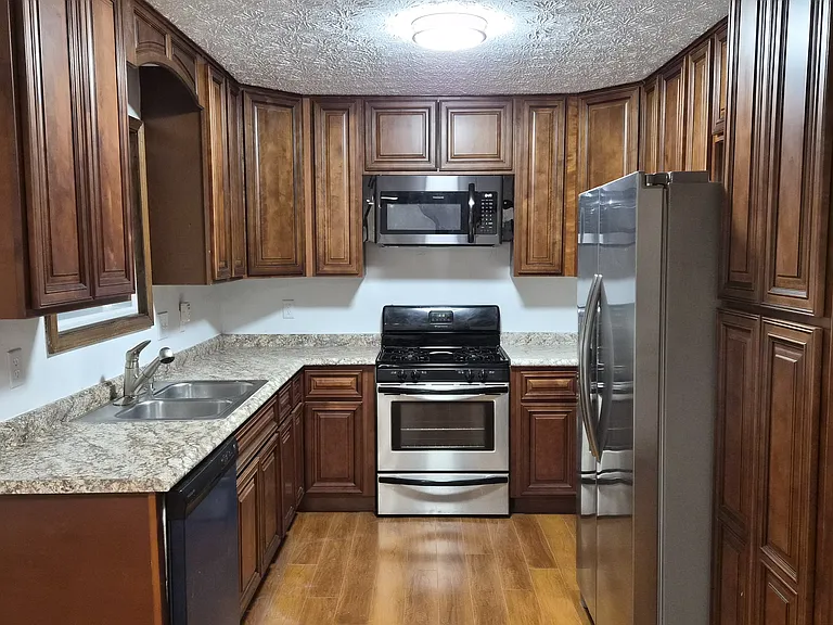 Kitchen with Dishwasher, Microwave, Gas Stove and French Door Refrigerator