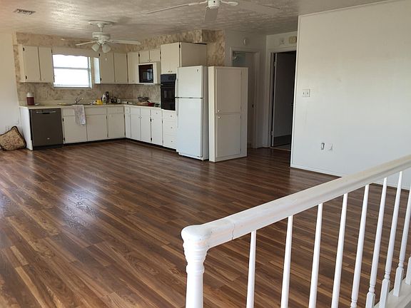 Open living area opens to deck