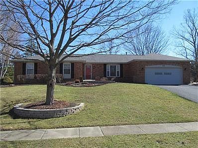 Completely maintenance free brick and vinyl exterior and newer dimensional roof.