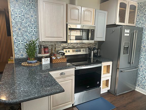 Full-size Kitchen with pots & pans, appliances, etc.