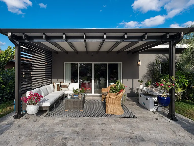 A similar patio cover roof with motorized blinds will be installed by the end of the month