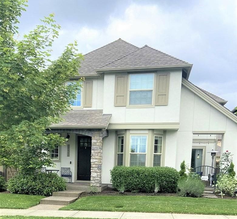 Elegant front of house, enter 2 car garage off back.