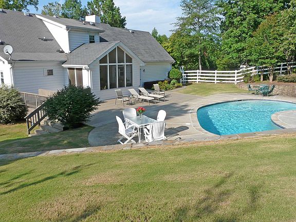 Private pool with stacked stone waterfall